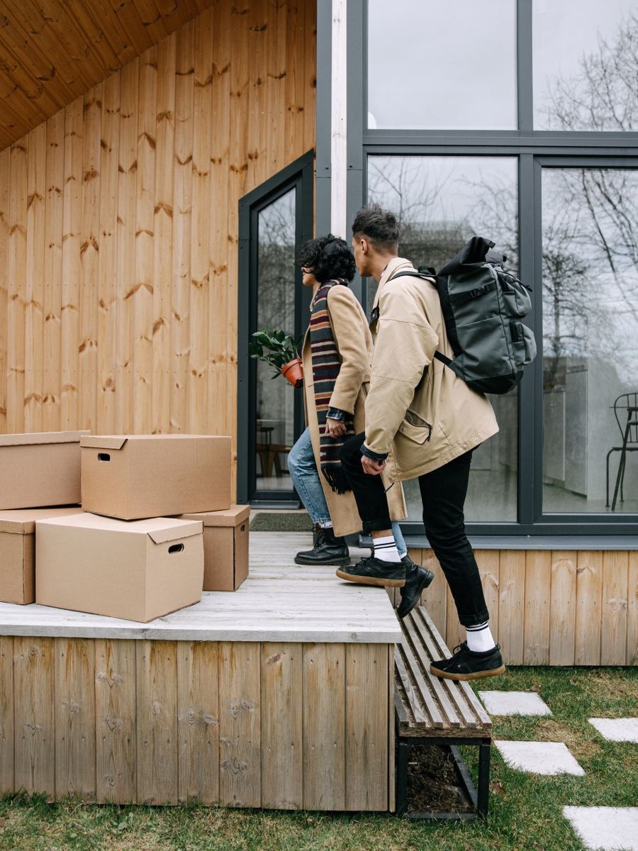 New homeowners arriving at their new front door